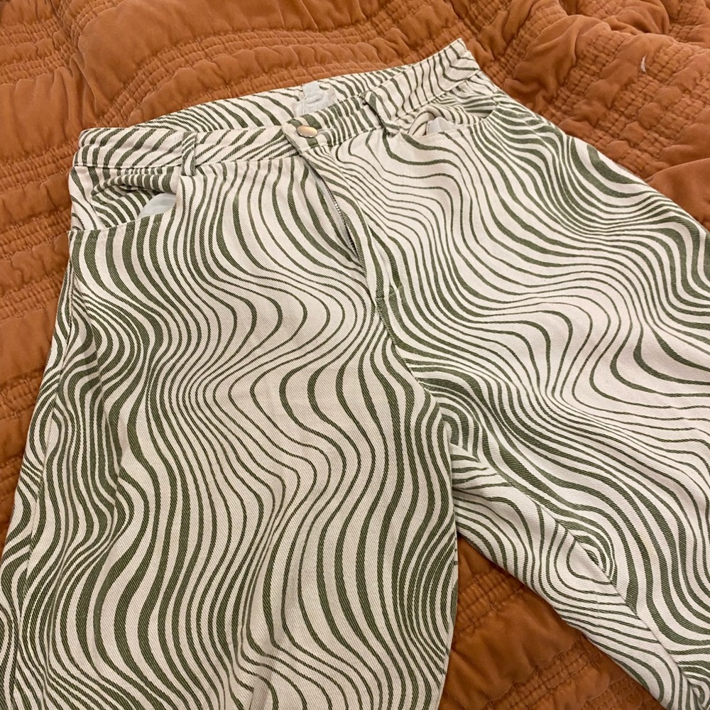 Lightweight jeans. Extremely comfortable. Sage green and white.